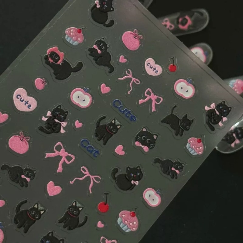 Schattig cartoon strik zwart k - Nail Art Motif recensie en prijs